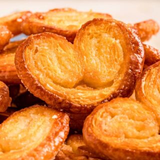 Close up of cookies piled on plate