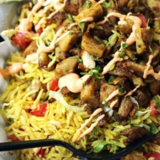 Bowl with rice, chicken, and sauce