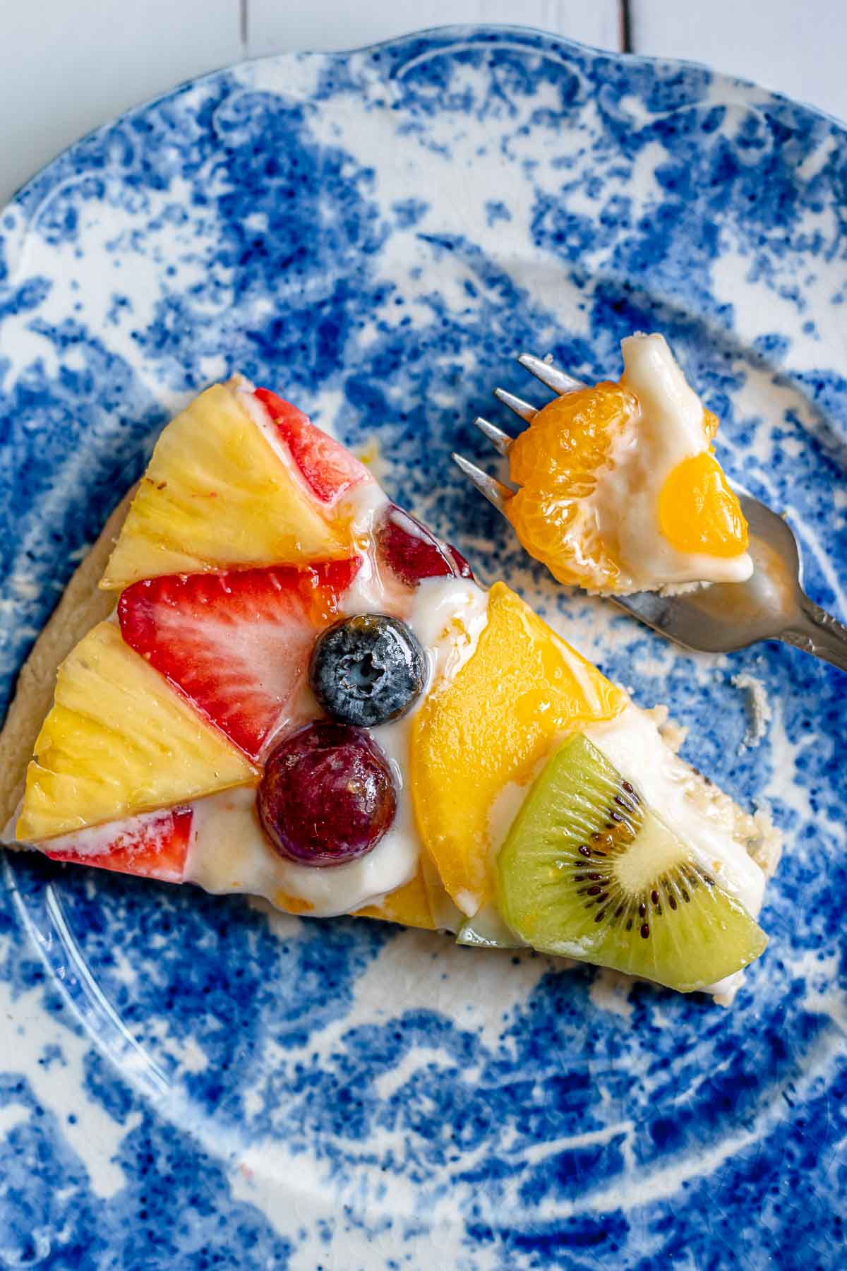 Fruit Pizza slice on a plate