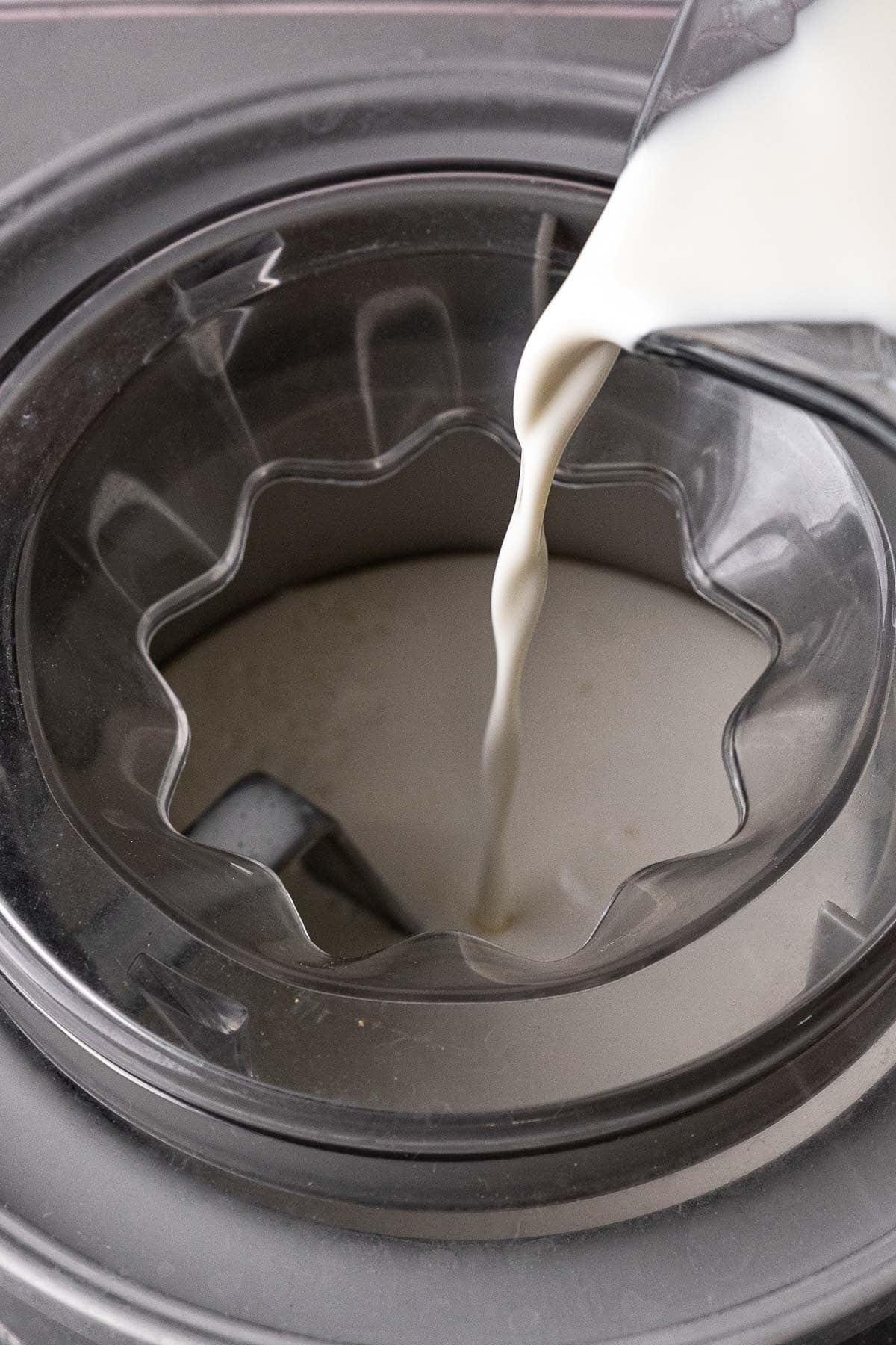 Wendys Vanilla Frosty pouring Frosty mixture into ice cream machine