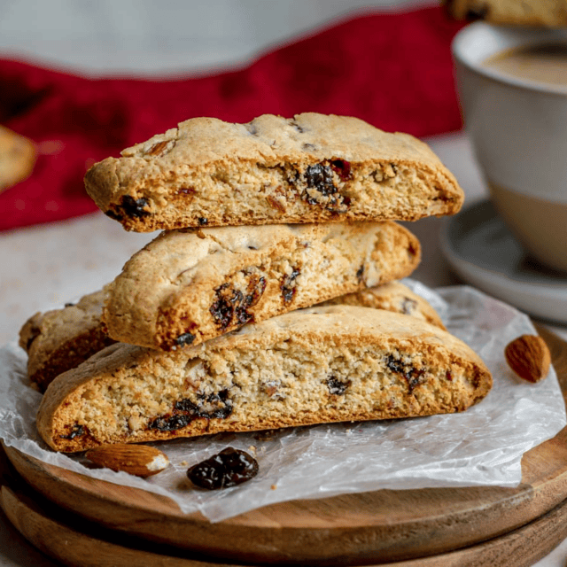 Stack of cookies on a wooden plate