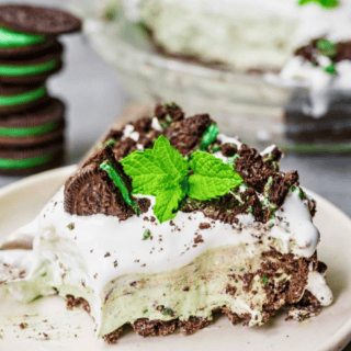 slice of green minty pie with oreos on a plate