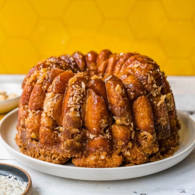 Hawaiian Monkey Bread finished on plate with coconut shreds