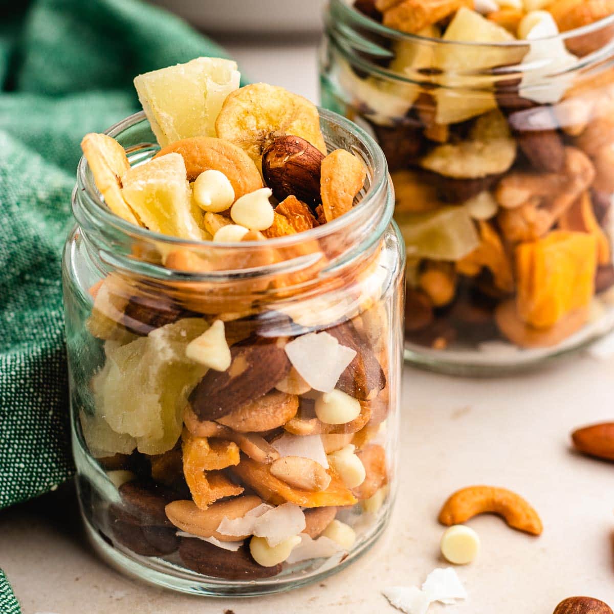 Tropical Trail Mix combined in glass jars, side view