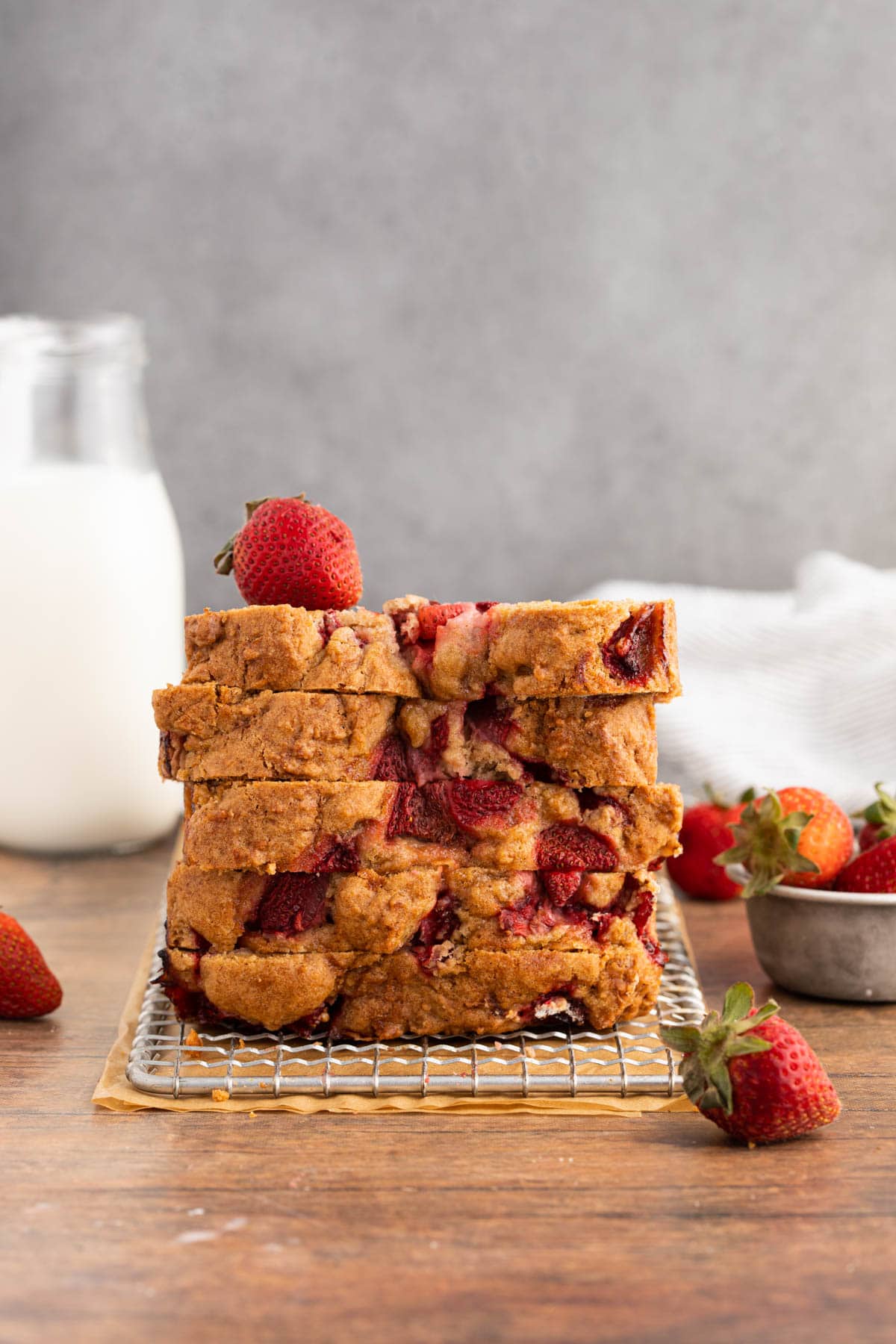 Strawberry Bread stack of bread slices on wire rack