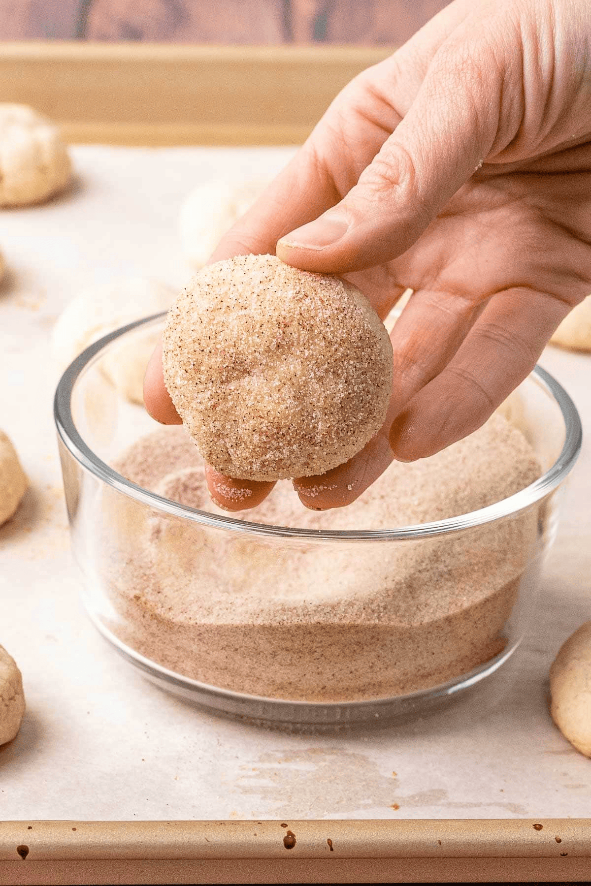 cookie dipped in cinnamon sugar
