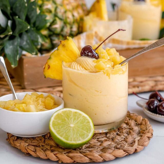 Small dessert glass with frozen fruit dessert.