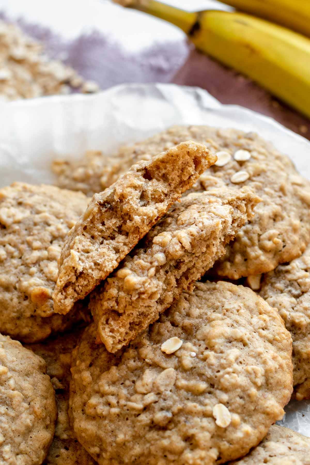 Banana Bread Cookies pile of cookies with bite taken out of top cookie