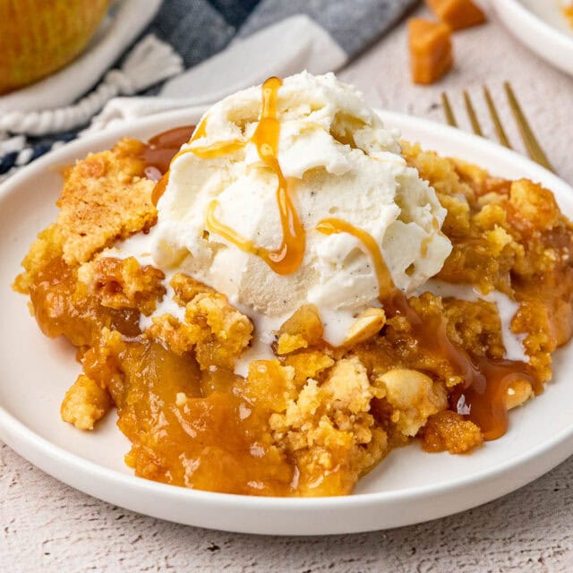 Dump cake with ice cream and caramel drizzle.