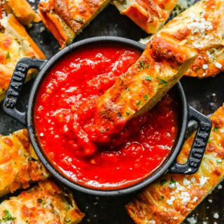 bread stick dipped in marinara 4x3