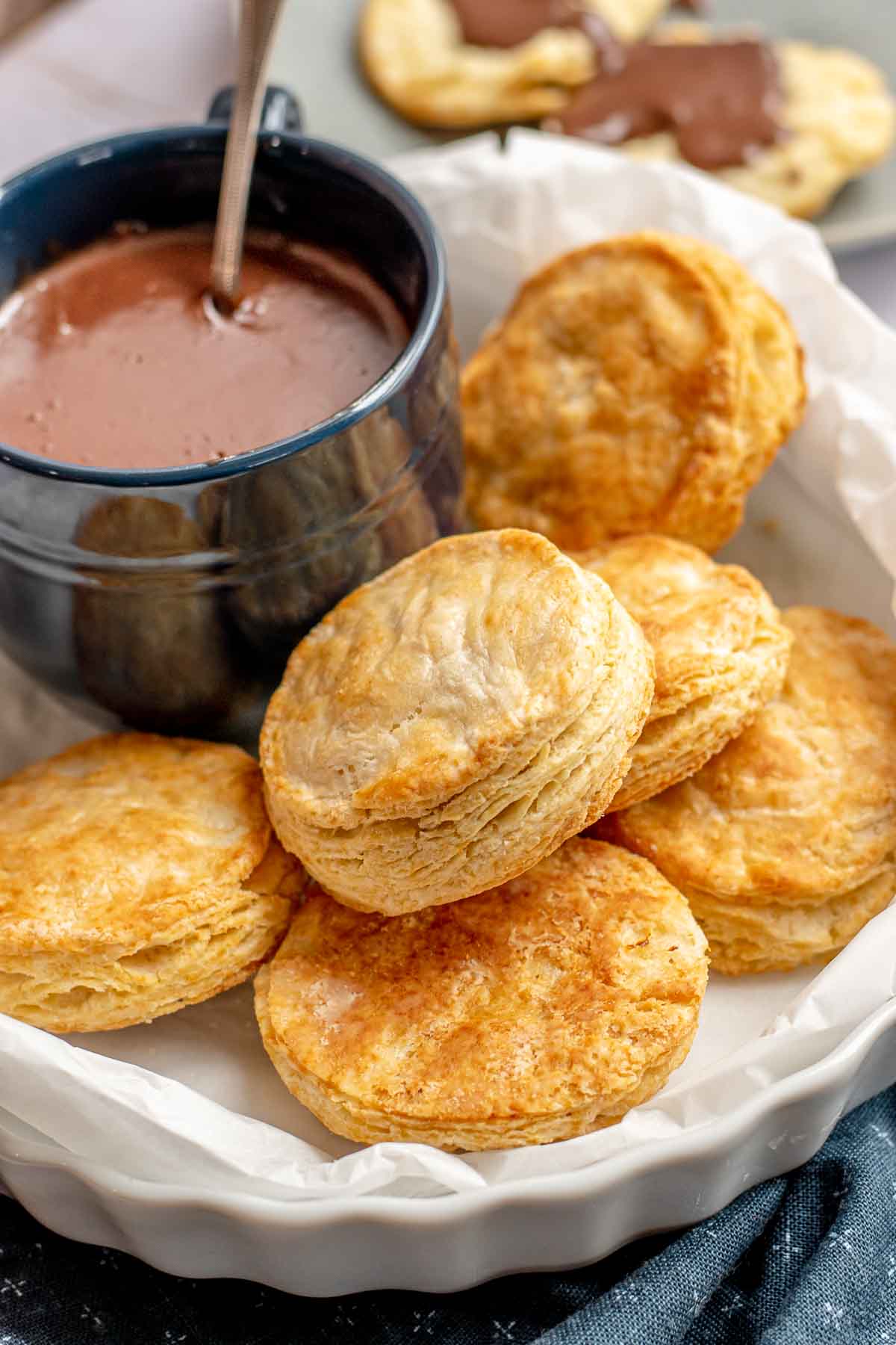 Chocolate Gravy plate of baked biscuits and gravy in cup with spoon