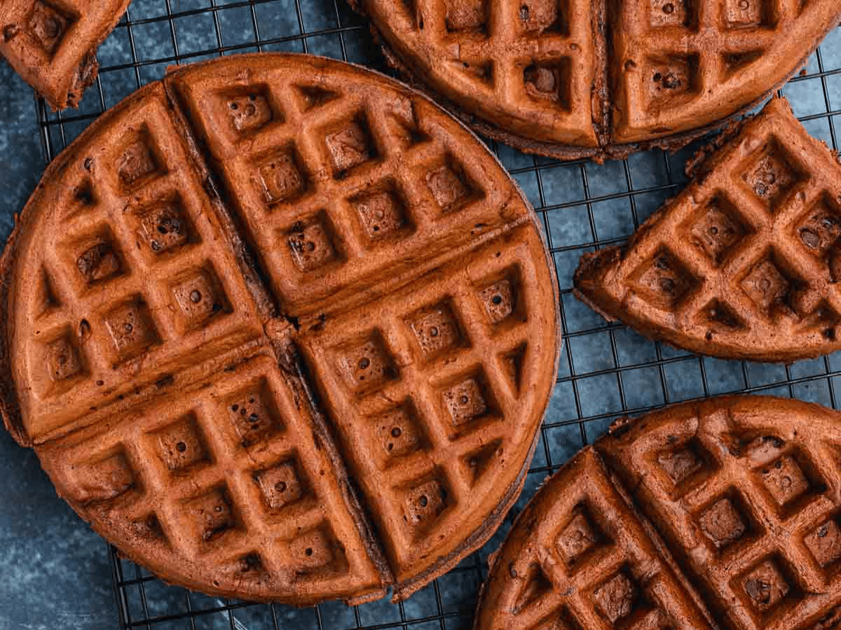 Waffles cooling on baking rack.