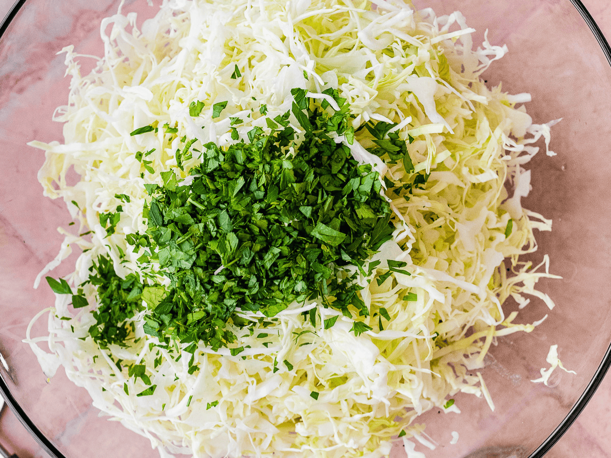 Unmixed ingredients for salad in bowl.