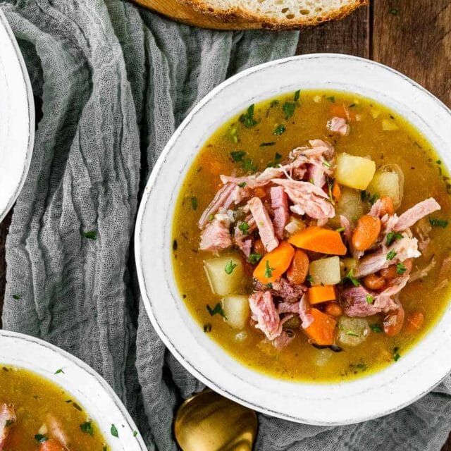 Bowls of soup over kitchen towel