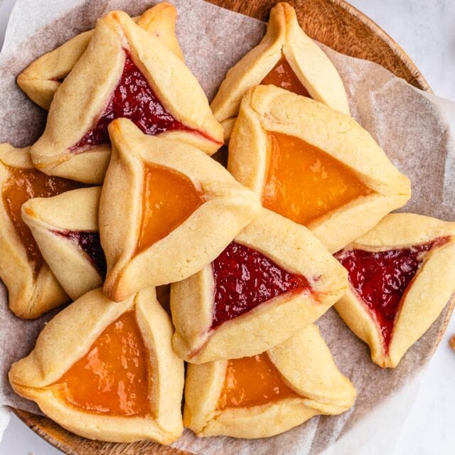 Jam filled pastries on serving plate.