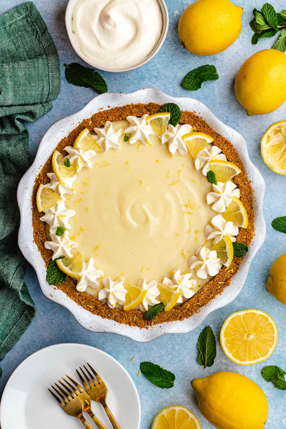 Lemon Pie finished pie with whipped cream and lemon slice garnishes around edge