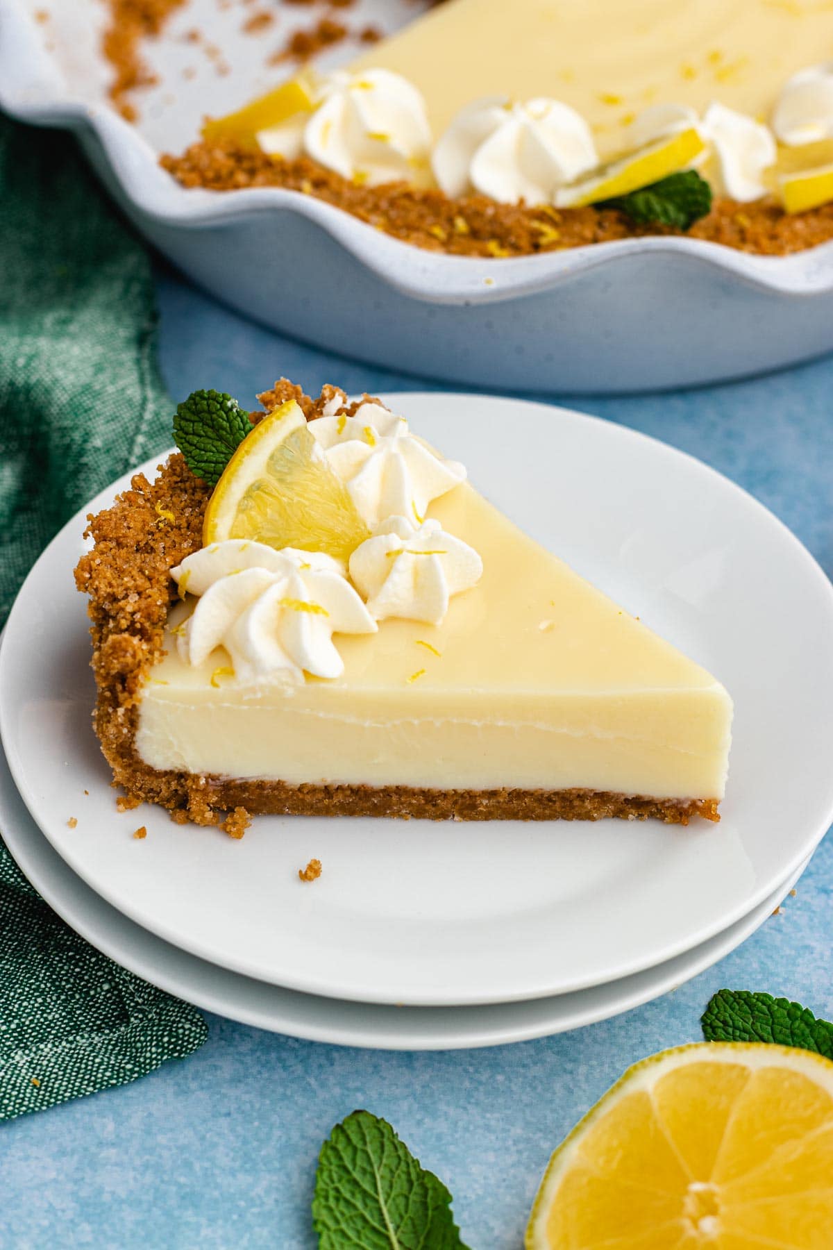 Lemon Pie slice of pie on plate with pie plate in background