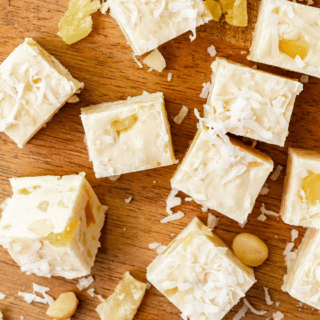 Dessert cut into squares on a cutting board