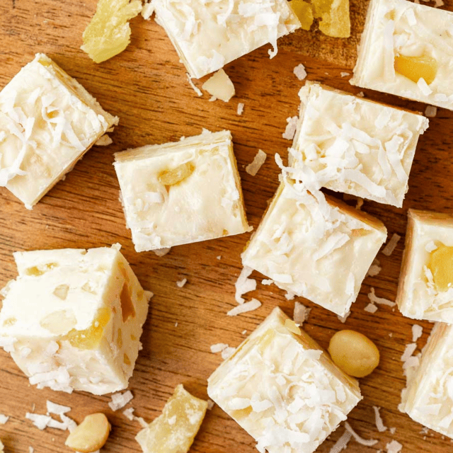 Dessert cut into squares on a cutting board