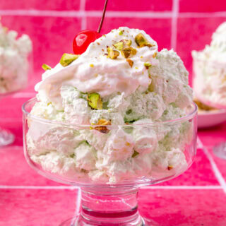 Dessert glass filled with whipped dessert.