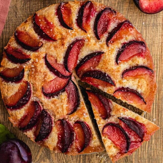 close up of cake with slice cut on serving platter