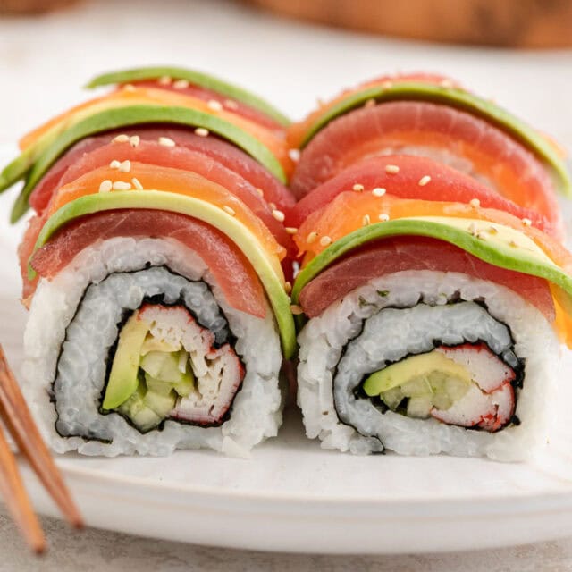 Sushi roll on dinner plate cross section view.