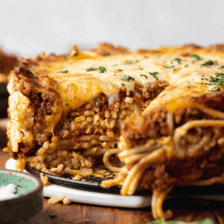 Pie made of spaghetti and red sauce.