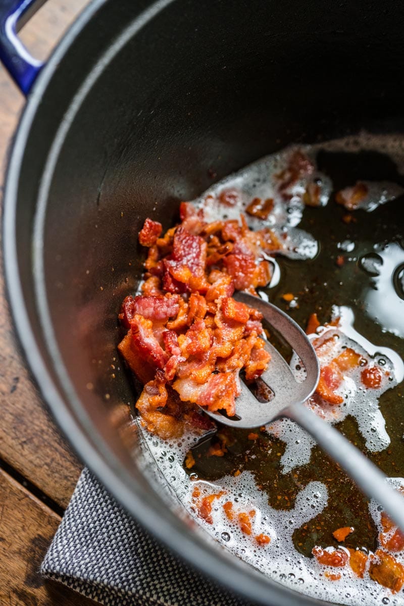 Sweet Corn Soup cooking bacon pieces in pot