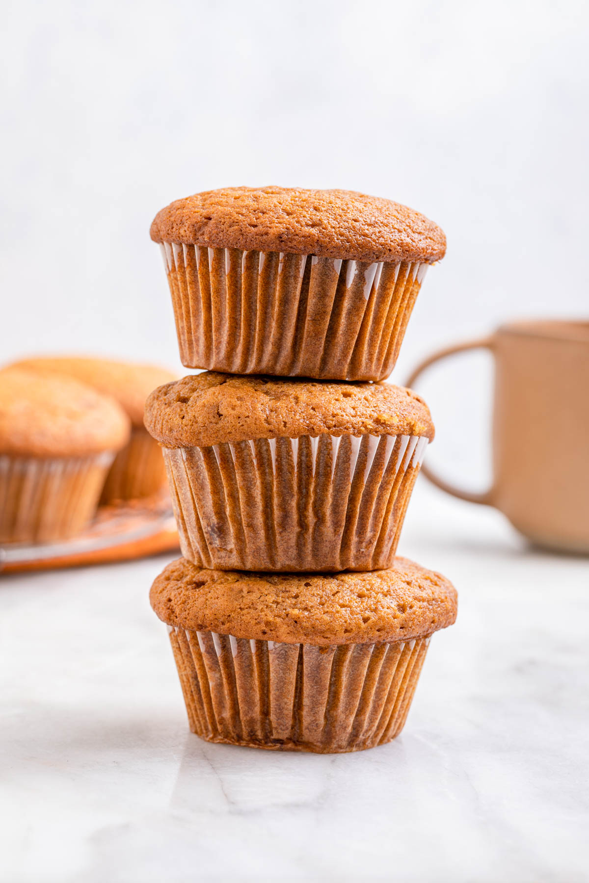 Sweet Potato Muffins stack of three baked muffins