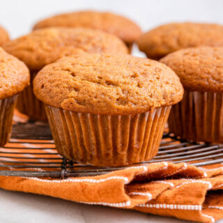 Sweet Potato Muffins baked muffins on orange towel
