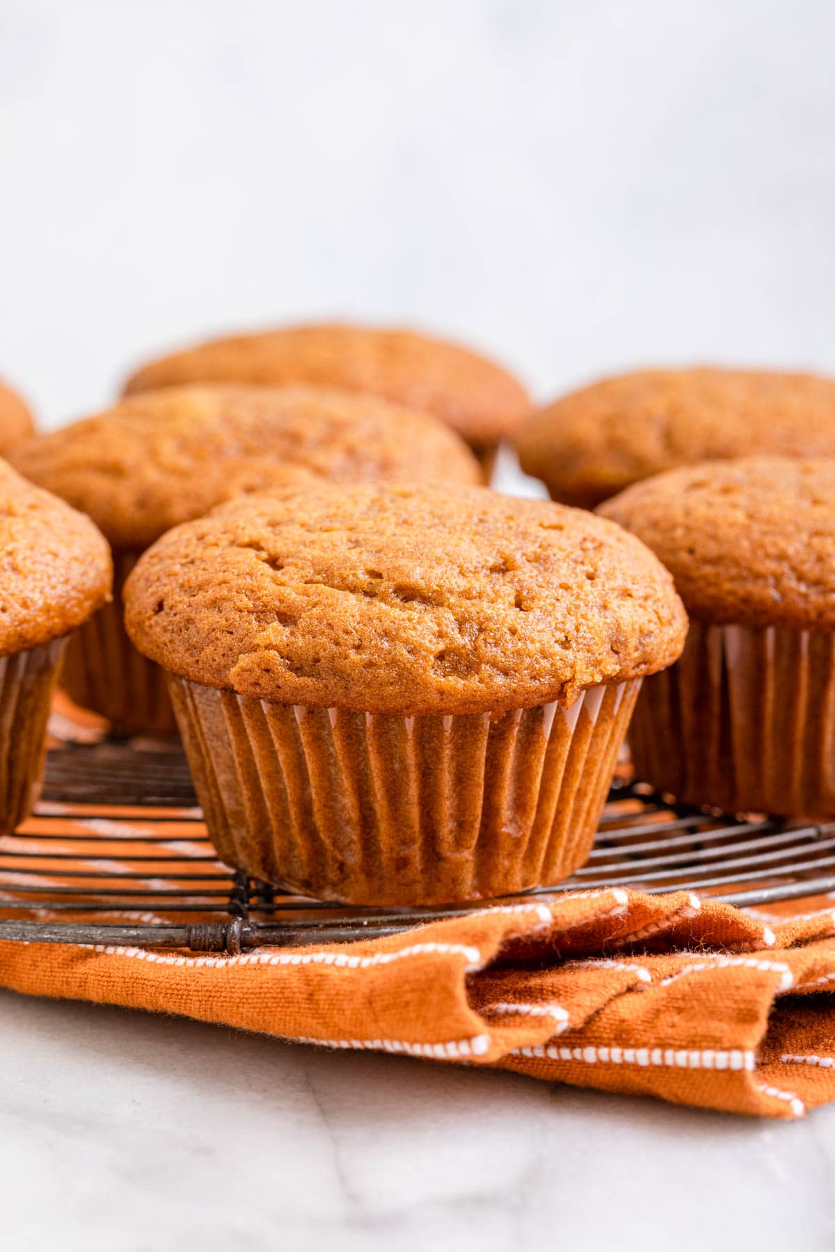 Sweet Potato Muffins baked muffins on orange towel