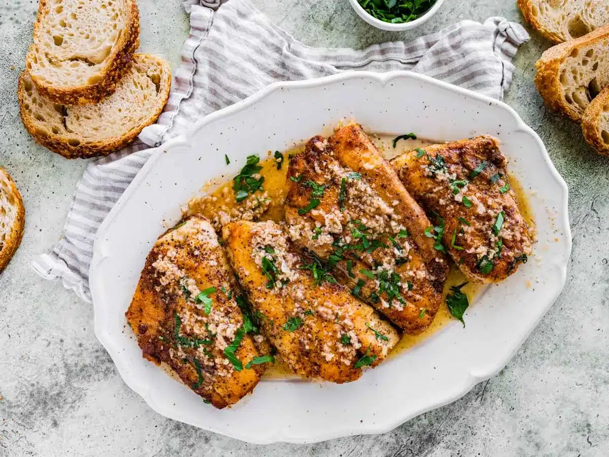 Serving plate with fried fish fillets.