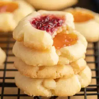 Stack of cookies on baking tray.