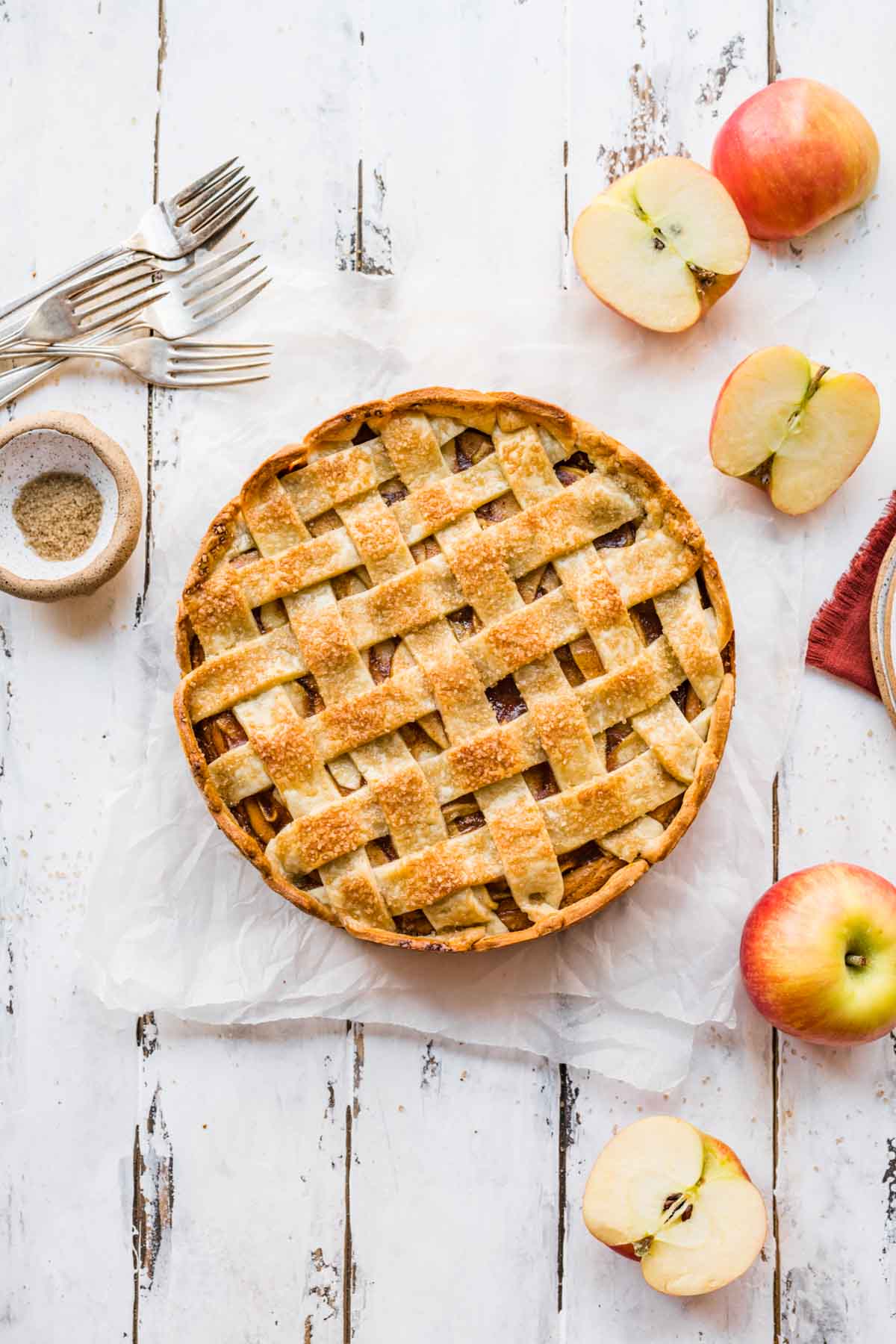 Apple Pie Cheesecake baked pie with apples around decoratively