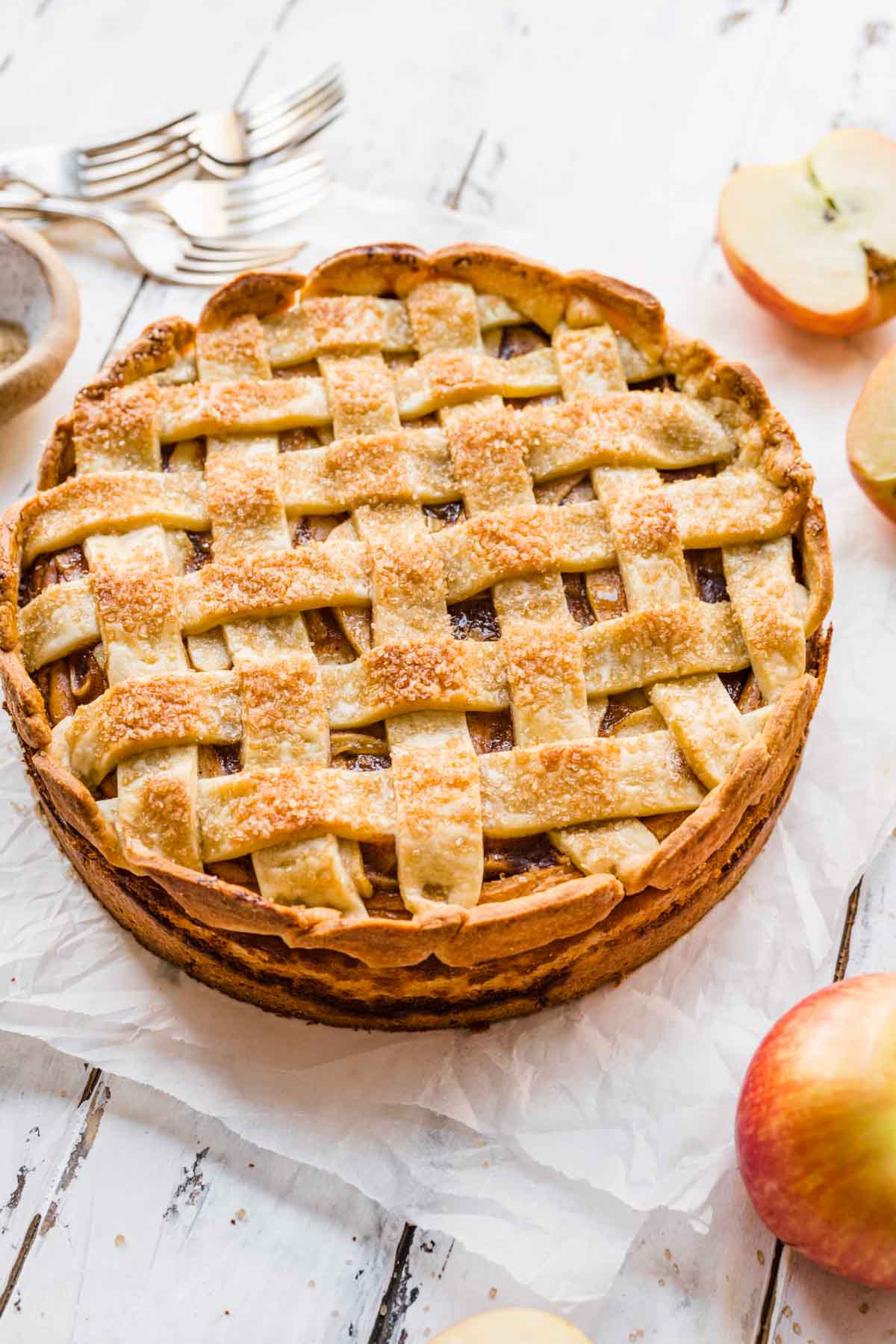 Apple Pie Cheesecake baked pie with apples around decoratively