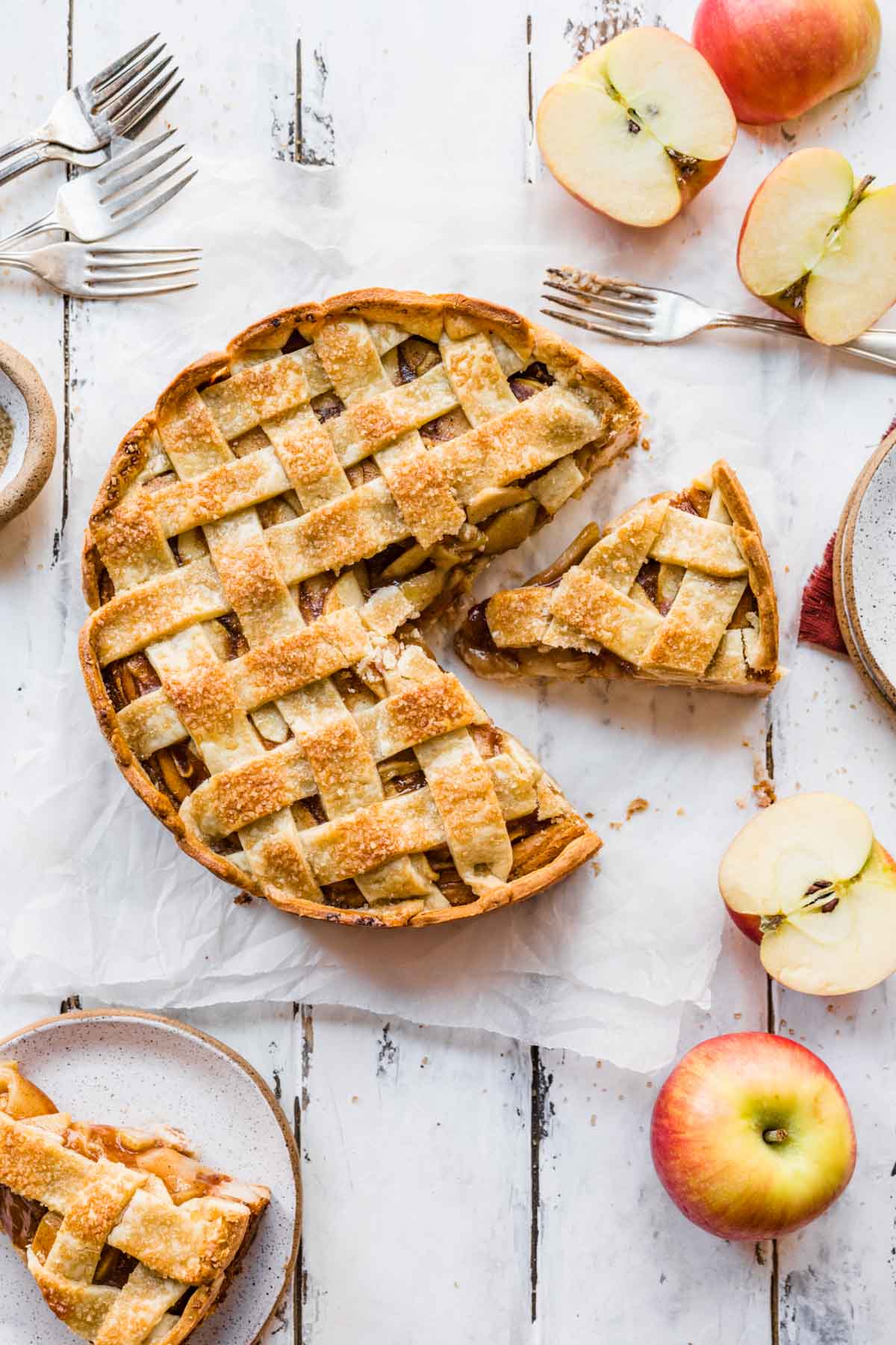 Apple Cheesecake Pie top down view of baked pie with slice removed