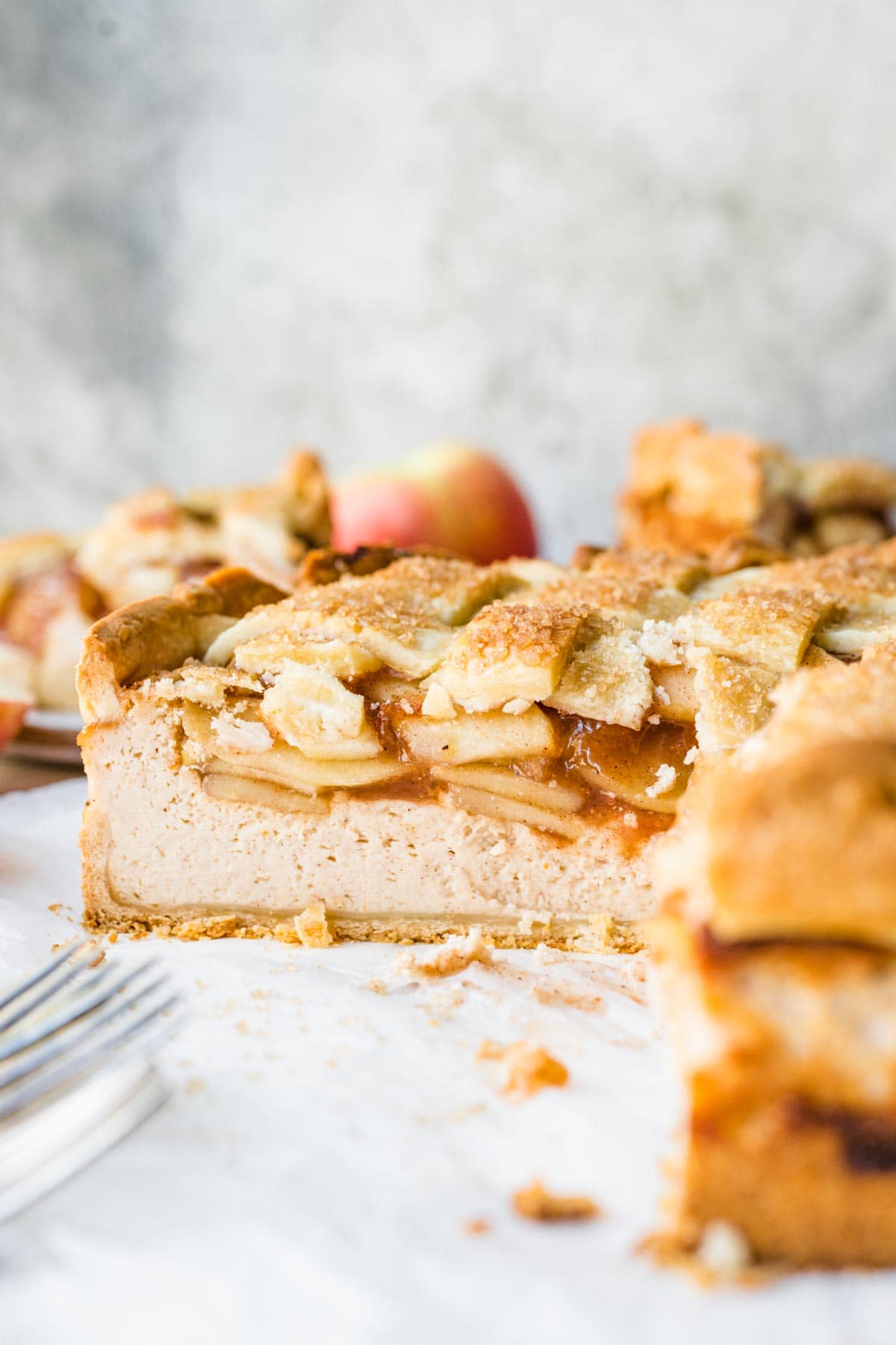 Apple Pie Cheesecake side view of cut section of finished pie