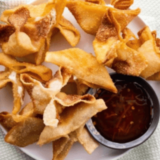 Top view of rangoon with sauce