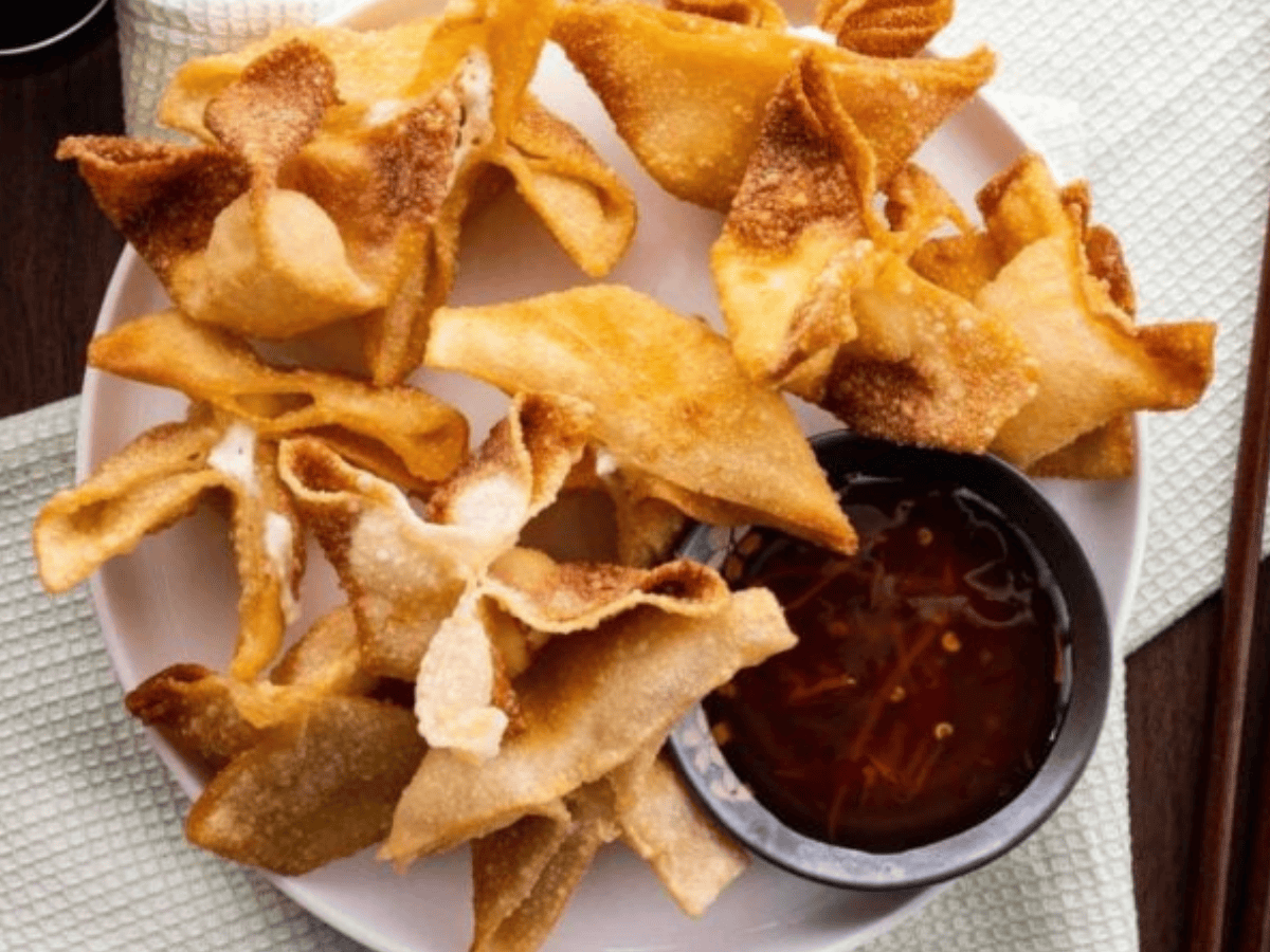 Top view of rangoon with sauce