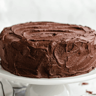 frosting on cake on cake stand