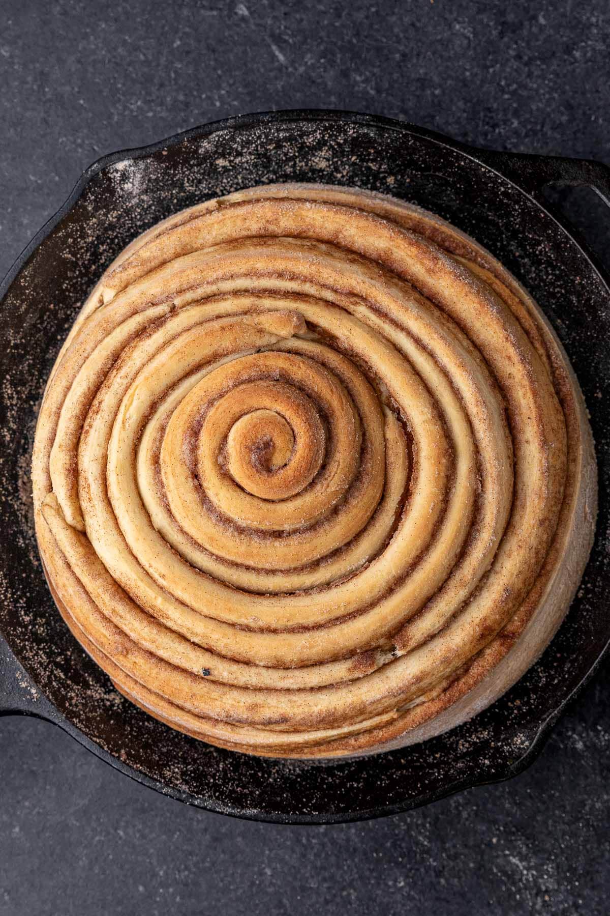 Giant Cinnamon Roll baked dough in skillet