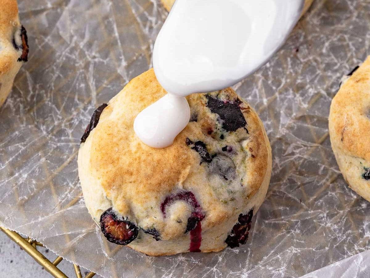 Drizzling glaze over baked biscuit