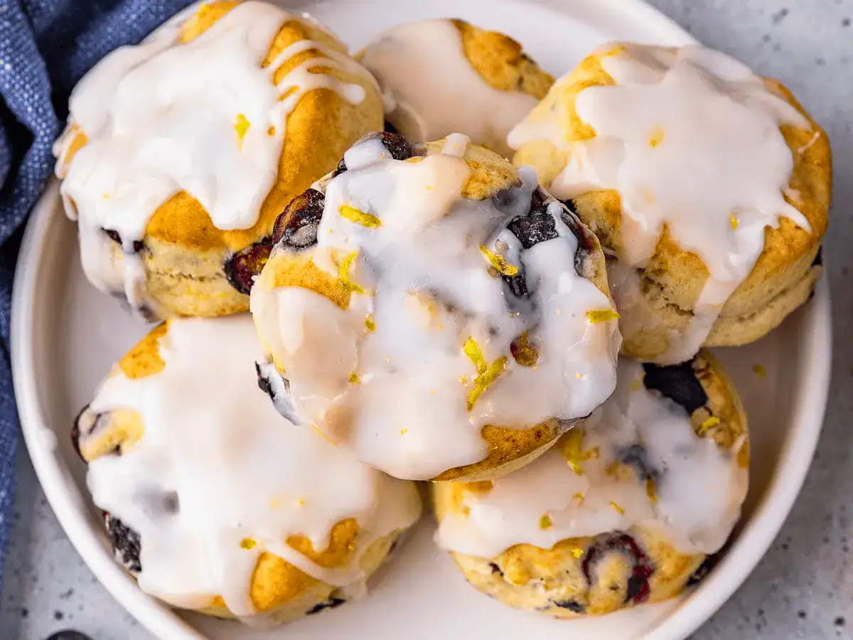 Pile of biscuits with blueberries and glaze