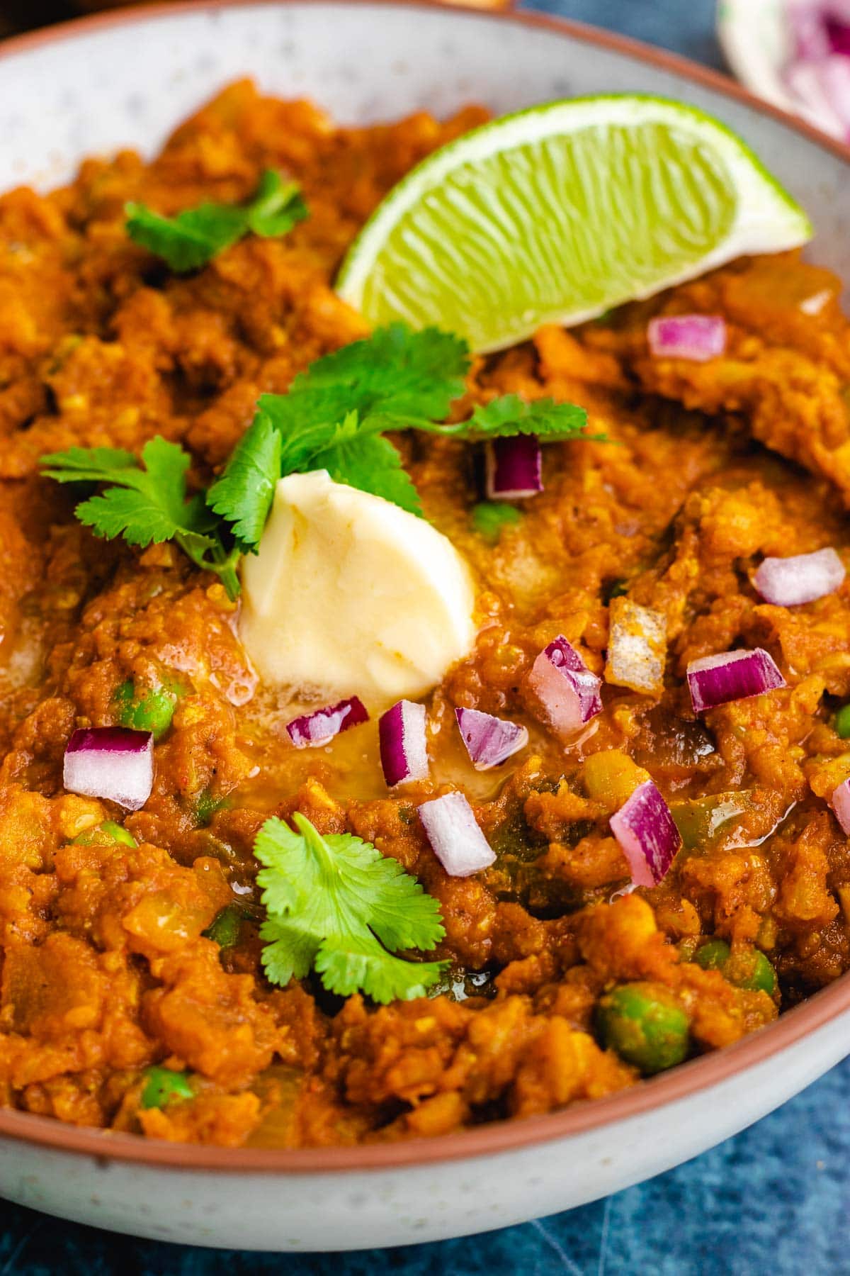 Pav Bhaji cooked and garnished in bowl