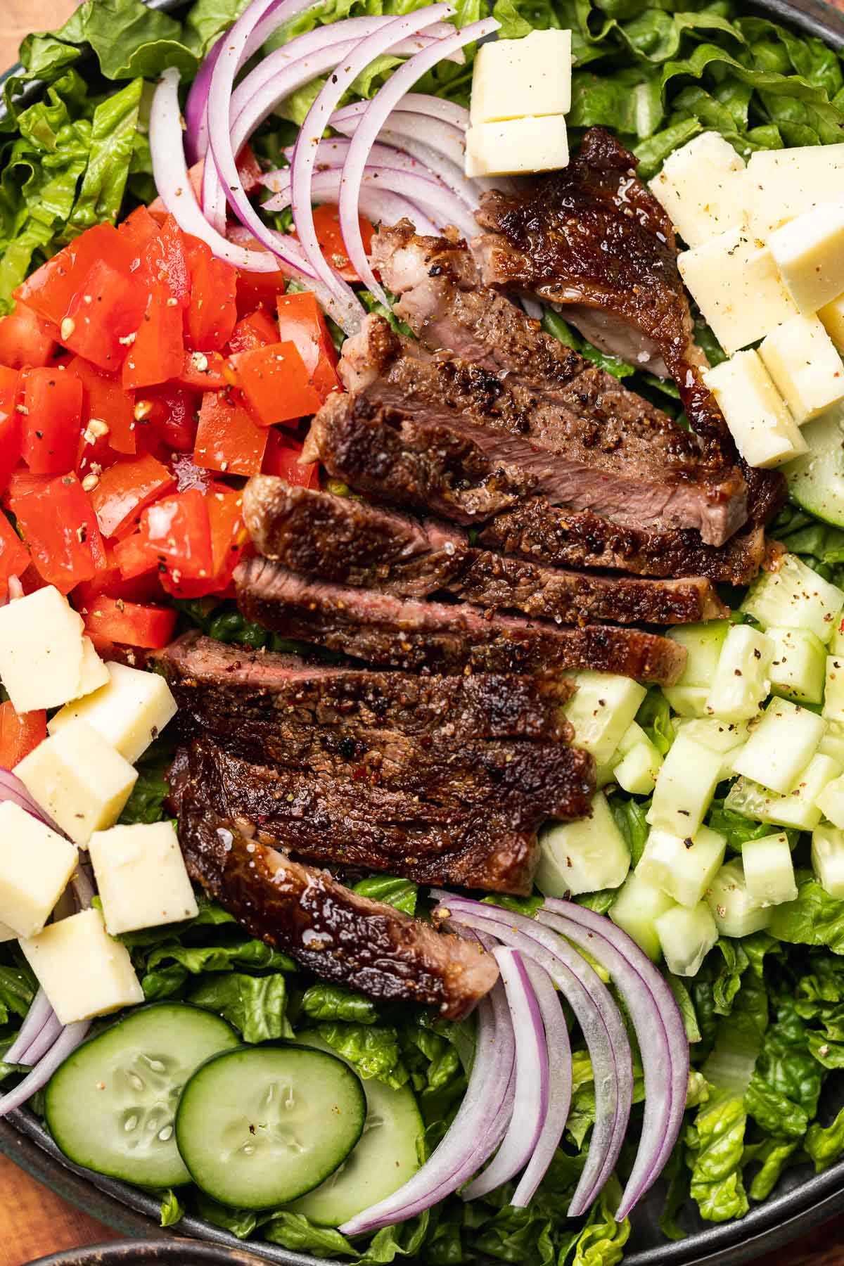 Steak Salad finished and assembled on plate without dressing