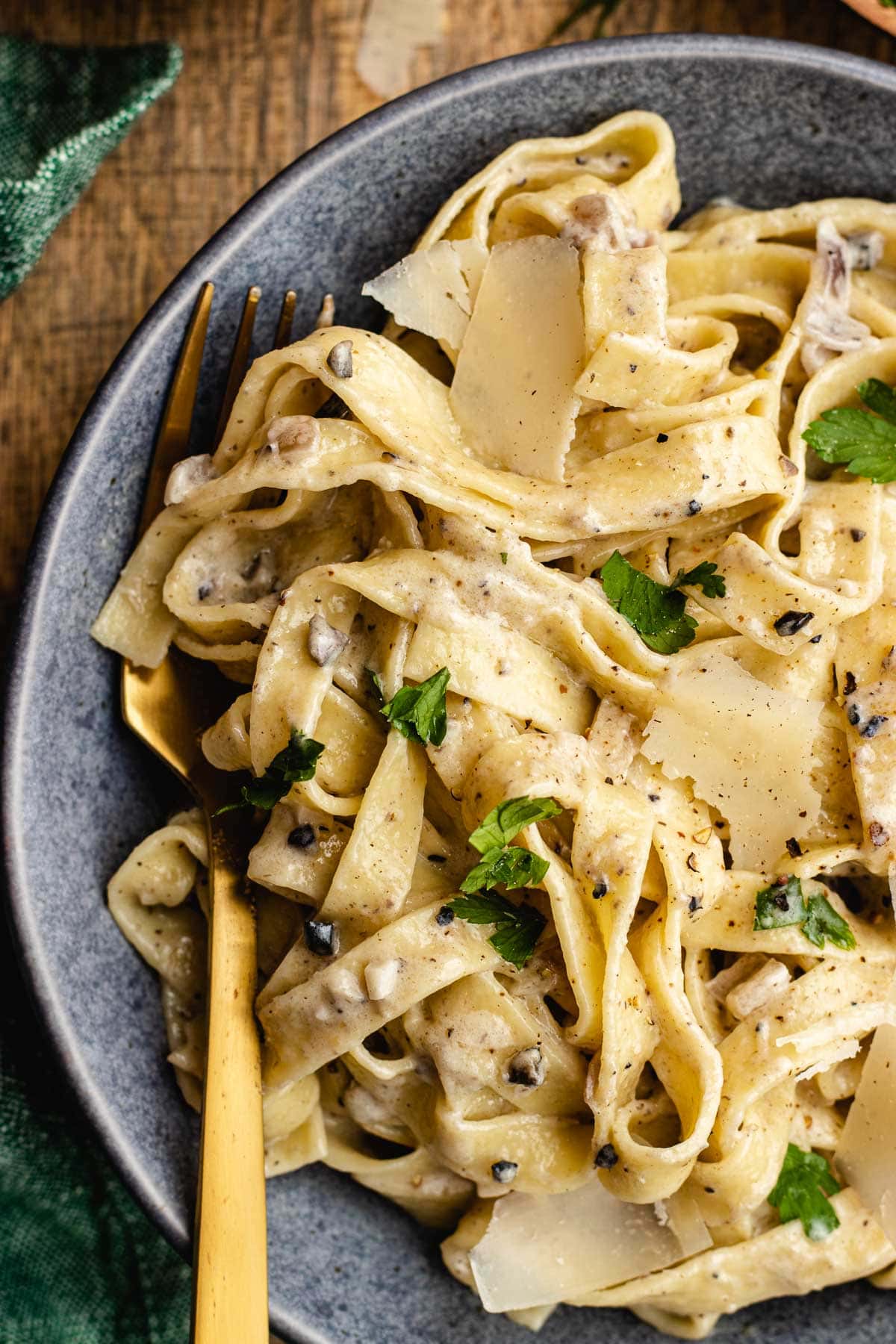 Truffle Pasta finished pasta and sauce in bowl, with fork