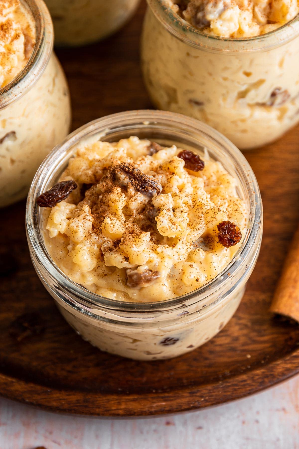 Arroz con Leche finished pudding in jars on tray