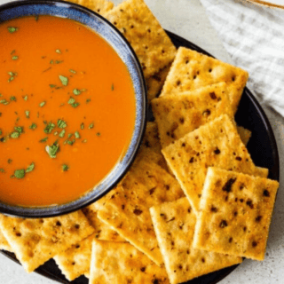 Bowl of soup served with crackers