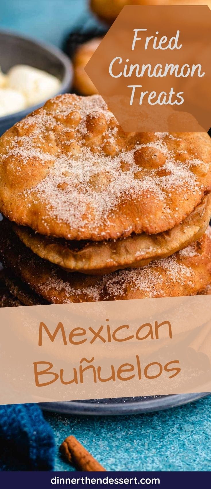 Mexican Bunuelos fried bunuelos covered in sugar and stacked on a plate