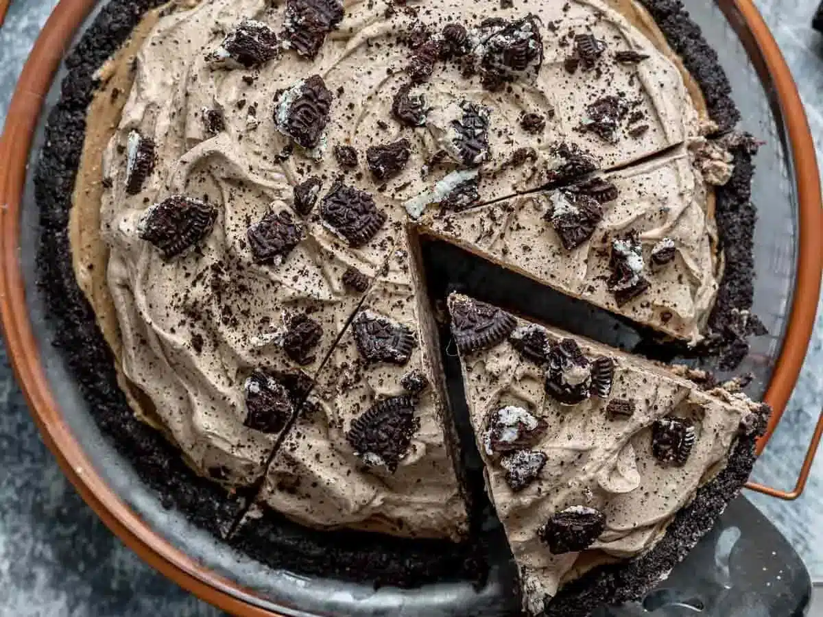 oreo pie from above with a slice being taken out
